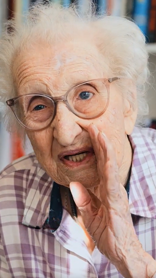 Senior woman talking with her hand