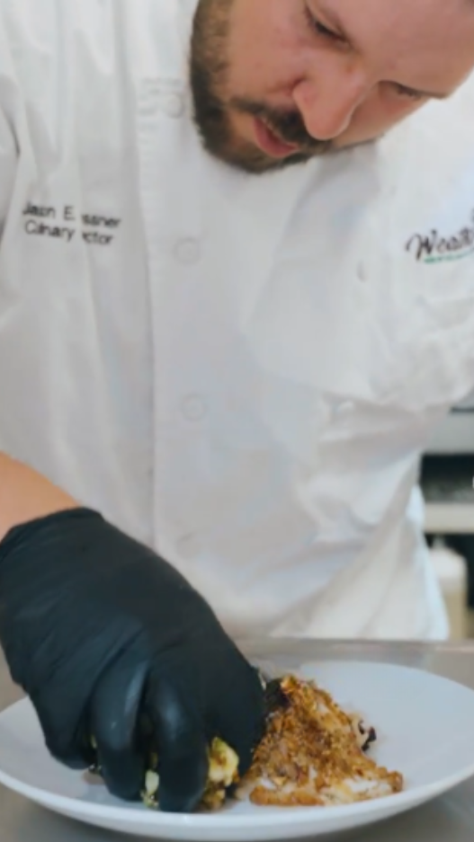 Chef plating food