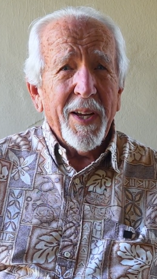 senior man in hawaiin shirt