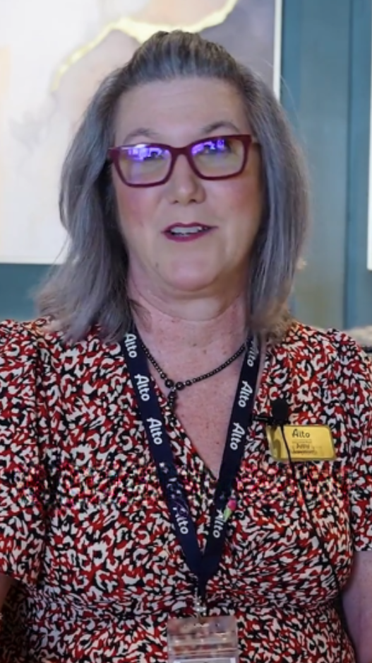 Woman in floral shirt