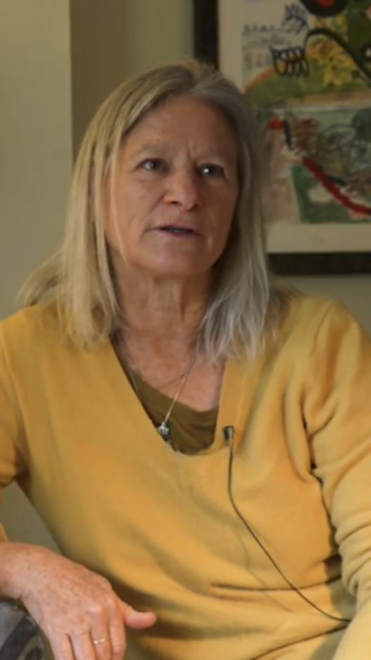 woman in a yellow sweater