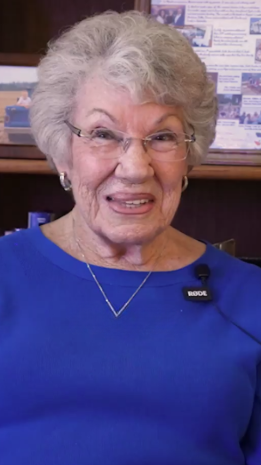 senior woman in blue sweater