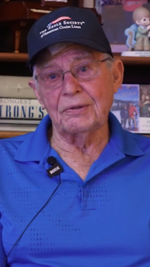 senior man in blue polo