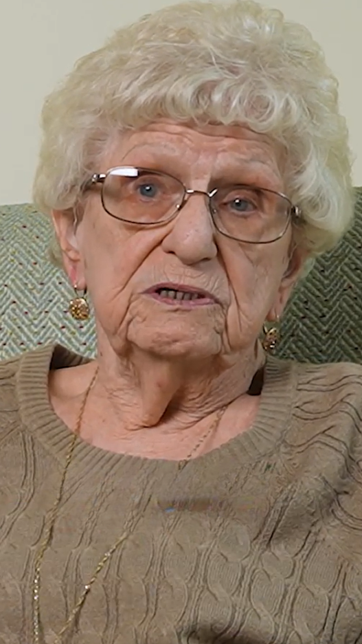 Senior woman in beige sweater