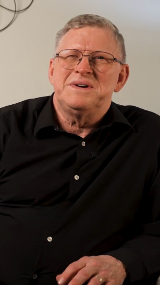 man in black button down